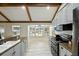 Bright eat-in kitchen area featuring bay window and views of the pool area at 11301 Donneymoor Dr, Riverview, FL 33569