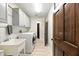 Laundry room with washer, dryer, sink and storage at 11301 Donneymoor Dr, Riverview, FL 33569