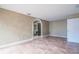 Spacious bedroom with an arched doorway and tile flooring leading to a closet area at 11503 Robles Del Rio Pl, Temple Terrace, FL 33617