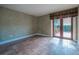 Large bedroom with a private entrance and tile flooring at 11503 Robles Del Rio Pl, Temple Terrace, FL 33617
