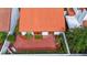 Aerial of private rear yard, framed with lush landscaping and hardscape patio at 11503 Robles Del Rio Pl, Temple Terrace, FL 33617