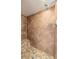 Tiled walk-in shower with a shower caddy and a built-in bench at 11503 Robles Del Rio Pl, Temple Terrace, FL 33617