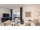 Bright living area featuring water views, modern furnishings, and neutral decor at 13236 Stable Pl, Parrish, FL 34219