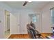 Bedroom with a closet and a wooden desk at 1708 Pond Lake Dr, Tampa, FL 33612