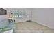 Bright and airy living room featuring neutral tile flooring and comfortable seating at 1708 Pond Lake Dr, Tampa, FL 33612