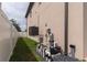 Backyard showcasing A/C unit, new fence, and filter for pool at 1808 W Erna Dr, Tampa, FL 33603