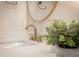 Close-up of modern bathroom faucet and decor on marble countertop at 1808 W Erna Dr, Tampa, FL 33603
