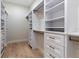 Large walk-in closet with custom shelving and drawers for optimal organization at 1808 W Erna Dr, Tampa, FL 33603