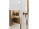 Close-up of a modern brushed gold shower fixtures at 1808 W Erna Dr, Tampa, FL 33603