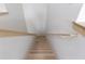 Looking down at a light and bright wooden staircase at 1808 W Erna Dr, Tampa, FL 33603