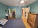 Bedroom with a walk-in closet providing ample storage space, and a view into an adjacent room at 1975 W Bay Dr # 304, Largo, FL 33770
