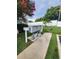 Community mailboxes with lush landscaping at 1975 W Bay Dr # 304, Largo, FL 33770