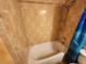 Shower with tiled walls, a bathtub, and a mounted shower head at 1975 W Bay Dr # 304, Largo, FL 33770