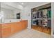 Bathroom boasts double sinks, tile flooring, and a walk-in closet with ample storage at 22623 Cliffside Way, Land O Lakes, FL 34639