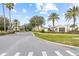 Community entrance to Valencia Gardens with signage and manicured landscaping at 22623 Cliffside Way, Land O Lakes, FL 34639