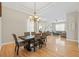 Dining room and living room with wood floors at 22623 Cliffside Way, Land O Lakes, FL 34639