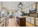 Bright kitchen features granite countertops, stainless appliances, and an island, perfect for cooking at 22623 Cliffside Way, Land O Lakes, FL 34639