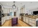 Spacious kitchen showcasing modern appliances, granite counters, ample cabinetry, and center island for meal prep at 22623 Cliffside Way, Land O Lakes, FL 34639