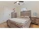 Nicely appointed main bedroom with ceiling fan, windows, and wood-look flooring at 2311 16Th S Ave, St Petersburg, FL 33712