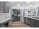 Charming kitchen equipped with stainless steel appliances and sleek marble countertops at 3725 Grand Forks Dr, Land O Lakes, FL 34639