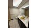 Bathroom has a yellow sink, toilet, and a shower-tub combo with tile at 4106 Old Mulberry Rd, Plant City, FL 33567
