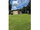 Spacious garage with ample storage and a large door at 4106 Old Mulberry Rd, Plant City, FL 33567