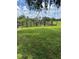 Expansive land with a wooden fence, perfect for recreation at 4106 Old Mulberry Rd, Plant City, FL 33567