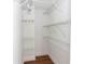 Walk-in closet with built-in shelving at 4117 Daventry Ln, Palm Harbor, FL 34685
