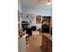 Bedroom featuring a desk, shelving, and a closet with various decor on display at 4217 Balington Dr, Valrico, FL 33596