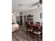 Bright and open dining room, featuring hardwood floors and ample space for entertaining guests at 4217 Balington Dr, Valrico, FL 33596