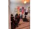 Exercise room with motivational decor and exercise bike on wood-look flooring at 4217 Balington Dr, Valrico, FL 33596