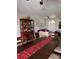 Open-concept dining and living area filled with natural light showcasing a large dining table and cozy seating area at 4217 Balington Dr, Valrico, FL 33596
