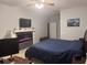 Cozy bedroom featuring a decorative fireplace, creating a warm and inviting atmosphere for relaxation at 4217 Balington Dr, Valrico, FL 33596