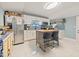 Bright and modern kitchen with stainless appliances, a large island, and ample storage at 5315 40Th N St, St Petersburg, FL 33714