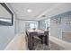 Cozy living room features a dining table and marble tile floors at 5315 40Th N St, St Petersburg, FL 33714