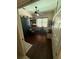 Bright home office with hardwood floors, built-in shelving, and a window providing natural light at 5811 White Oak Bayou Ct, Bradenton, FL 34203