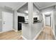 Bright and open kitchen with a breakfast bar and stainless steel appliances at 717 Pinewood Dr, Dunedin, FL 34698