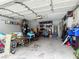 Spacious garage with ample storage and room for multiple bicycles and other sporting goods at 9707 Kings Canyon Pl, Tampa, FL 33634