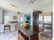 The kitchen features stainless steel appliances, an island, and an open concept layout at 9707 Kings Canyon Pl, Tampa, FL 33634