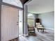 Bright front entry with seating area and light gray walls at 9707 Kings Canyon Pl, Tampa, FL 33634