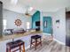 Open-concept living room with bar seating area at 9707 Kings Canyon Pl, Tampa, FL 33634