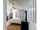 View of the main bedroom featuring a bed, dresser and light blue walls at 9707 Kings Canyon Pl, Tampa, FL 33634