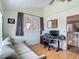 Office space with natural light, wood floors, and comfortable seating at 9707 Kings Canyon Pl, Tampa, FL 33634