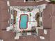 Aerial view of the community pool, sun deck, and roof lines at 1000 W Horatio St # 129, Tampa, FL 33606