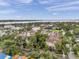 Hyde Park Place aerial view showcasing lush landscaping, mature trees and water views at 1000 W Horatio St # 129, Tampa, FL 33606