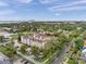 Aerial view of Hyde Park Place, community green space, surrounding mature trees, and city views at 1000 W Horatio St # 129, Tampa, FL 33606