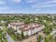 Beautiful aerial view of Hyde Park Place showing mature trees, lush landscaping, and water views at 1000 W Horatio St # 129, Tampa, FL 33606