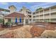 Community courtyard with patio seating and a relaxing atmosphere, featuring a nearby jacuzzi at 1000 W Horatio St # 129, Tampa, FL 33606