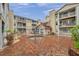 Tranquil courtyard featuring seating and a soothing jacuzzi enclosed with safety fencing at 1000 W Horatio St # 129, Tampa, FL 33606