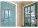 Commercial building entryway shows doors labeled 'WOMEN' and a gym with equipment visible through a windowed door at 1000 W Horatio St # 129, Tampa, FL 33606